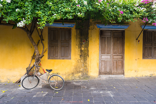 Hoi An, Vietnam - May 25, 2016: Old houses in Hoi An ancient town, UNESCO world heritage. Hoi An is one of the most popular destinations in Vietnam.