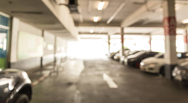 istock Abstract blur  car park in shoping mall 612485106