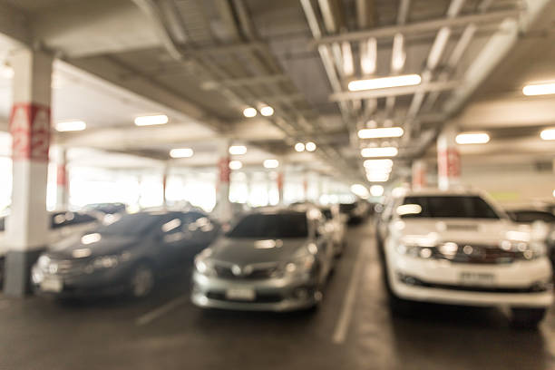 istock Abstract blur  car park in shoping mall 612485202