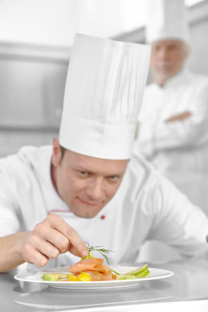 istock Chefs preparing the delicious salmon 612485298