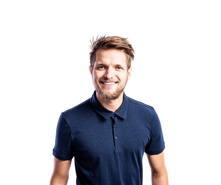 Hipster man in blue t-shirt, studio shot on white background, isolated