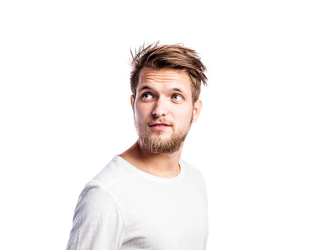 istock Hipster man in white t-shirt, studio shot, isolated 612485820