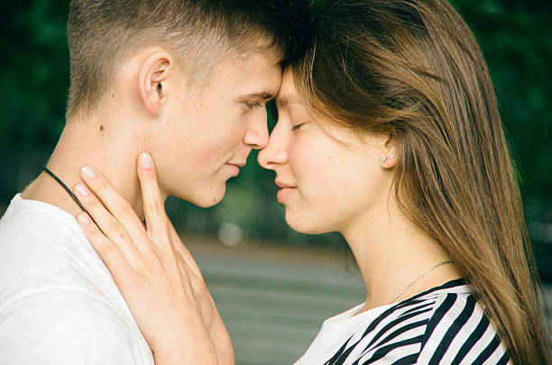istock Tender young couple face to face 612487102