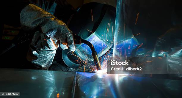 Industrial Steel Welder In Factory Stock Photo - Download Image Now - Welder, Welding, Shipyard