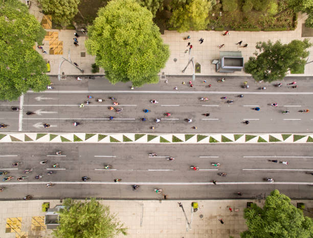 istock People cycling at the street 612488414