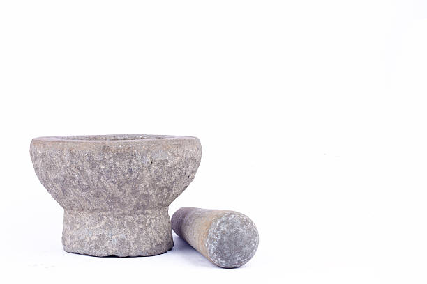 istock Old used granite stone mortar and pestle , Thai cooking tool 612490522