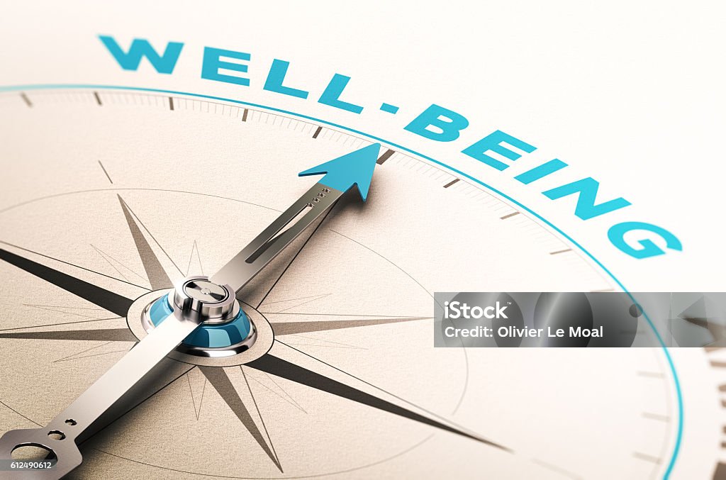 Well-being or wellness Compass with needle pointing the word well-being. 3D illustration with blur effect. Concept of wellbeing or wellness Wellbeing Stock Photo
