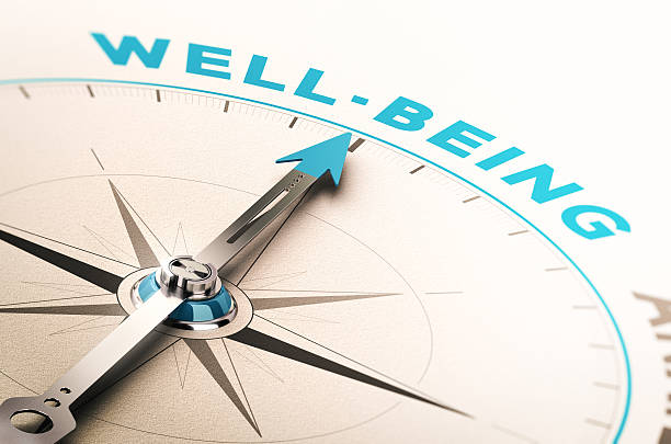 Well-being or wellness Compass with needle pointing the word well-being. 3D illustration with blur effect. Concept of wellbeing or wellness wellness concept stock pictures, royalty-free photos & images