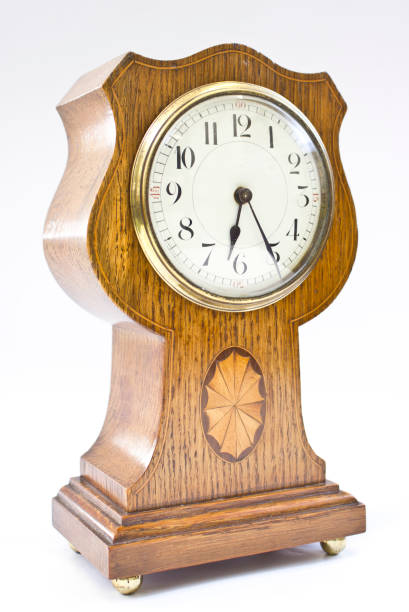 istock Antique Vintage Wooden Clock on White Background 612490912