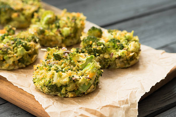 istock Hot tasty muffins with broccoli for dinner. Cooking concept 612493380