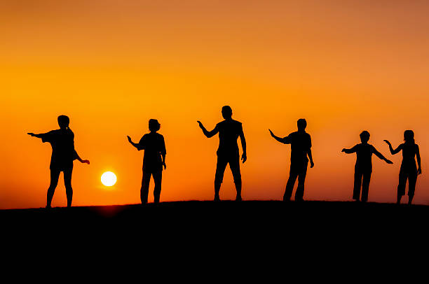 istock meditation in nature on sunset 612494084