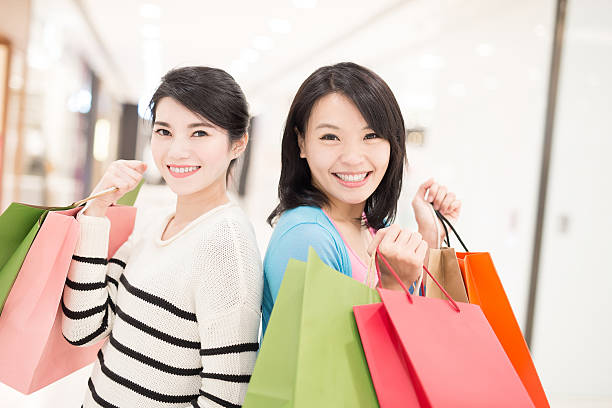 istock Happy woman shopping 612494964