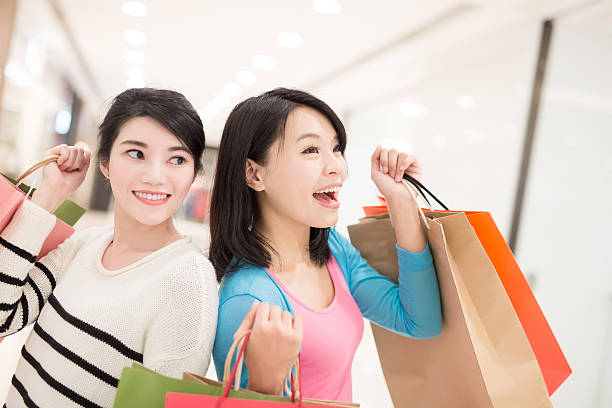 istock Happy woman shopping 612495046