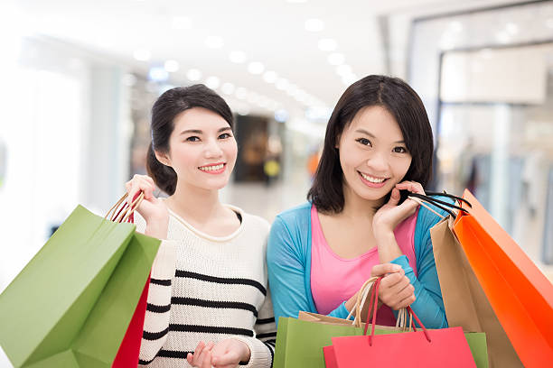 istock Happy woman shopping 612495368