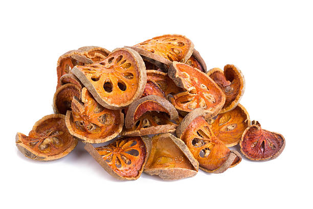 istock dried quince slices on a white background 612497378