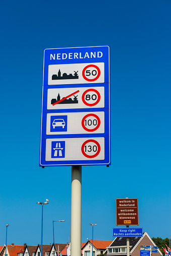 Welcome signs, in Dutch, English, German and French text and with national speed limits in km/h. Hoek van Holland, Netherlands is a coastal village and port which has a ferry service to eastern england, hence the \