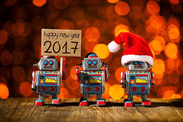 istock Three retro robots posing for Christmas. New year 2017. Santa. 612498410