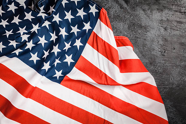 istock USA flag on grey background 612504816