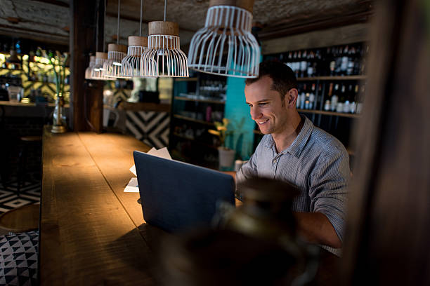 istock Business owner doing the books at a restaurant 612505168