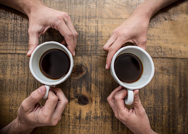istock Couple on a date at a cafe 612505570