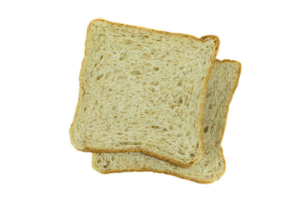 istock whole wheat bread, isolated on white background 612505998