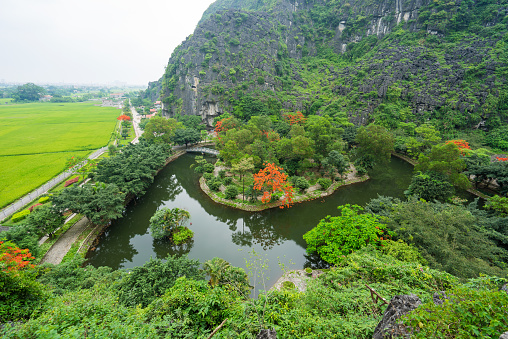 Trang An, Tam Coc, Ninh Binh, Viet nam. It's is UNESCO World Heritage Site, renowned for its boat cave tours. It's Halong Bay on land of Vietnam