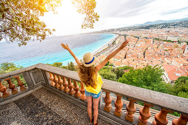 Traveling in Nice city Young female traveler enjoying great view on the Nice city in France french riviera photos stock pictures, royalty-free photos & images