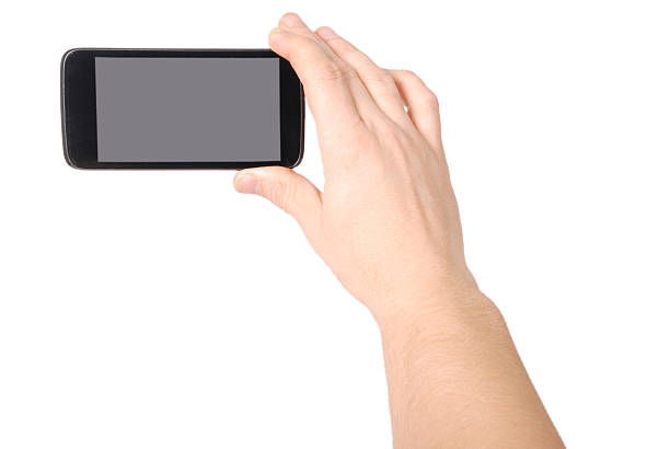 istock Man hand holding the smartphone 612509918