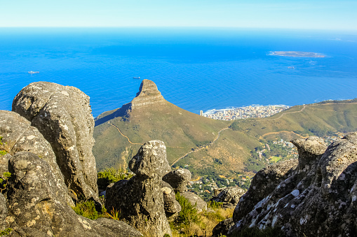 Table Mountain National Park, Trail Hike. The plateau, flanked by Devil's Peak to the east and by Lion's Head to the west, forms a backdrop to Cape Town.