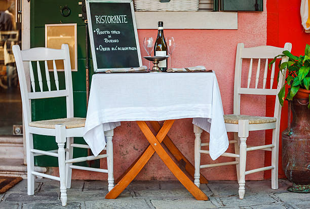 istock Italian ristorante served table with white table-cloth 612511752
