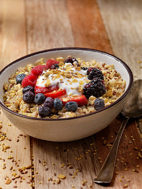 istock Hot 7 Grain Breakfast Cereal With Yogurt and Fresh Fruit 612513034