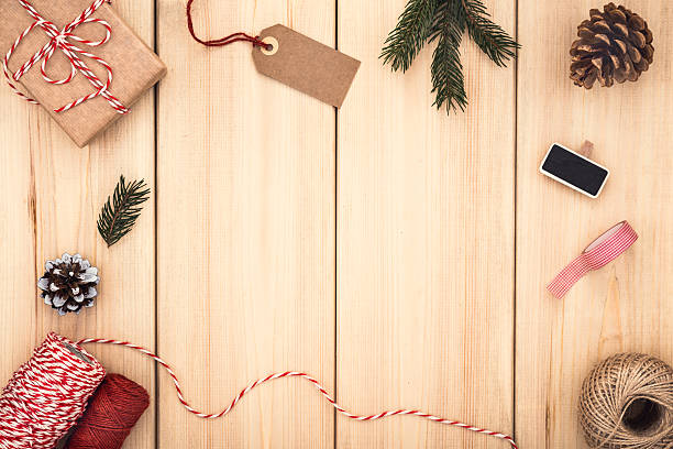 Natural style handcrafted gift box on wooden background. Packaging ideas.