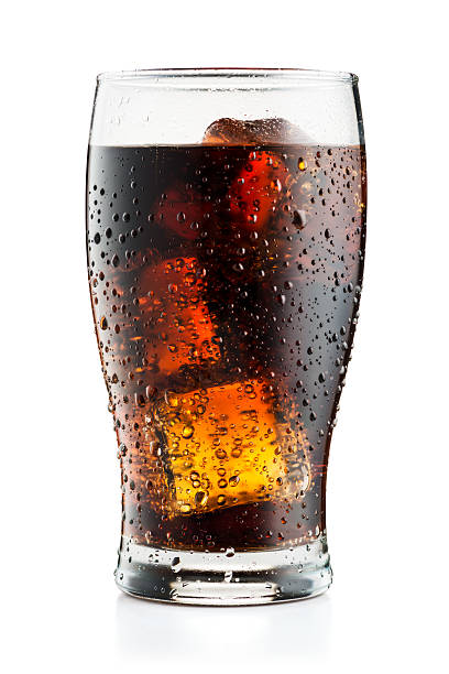 istock Cola glass with ice cubes and droplets 612522314