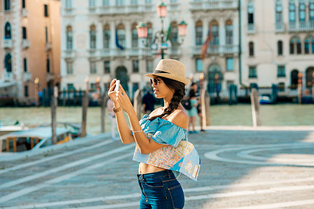 istock young woman exploring around touristic attractions 612522986