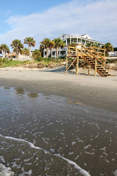 istock Wooden stair to the beach 612523056