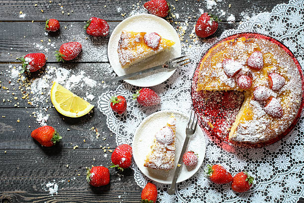 istock Lemon cake with strawberries, sugar end chocolate 612525150