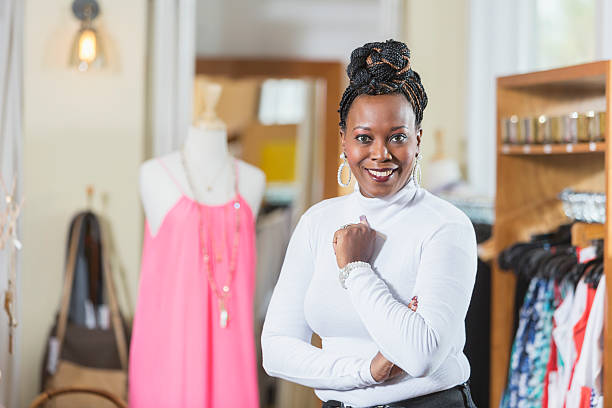istock Successful small business owner in boutique 612614386