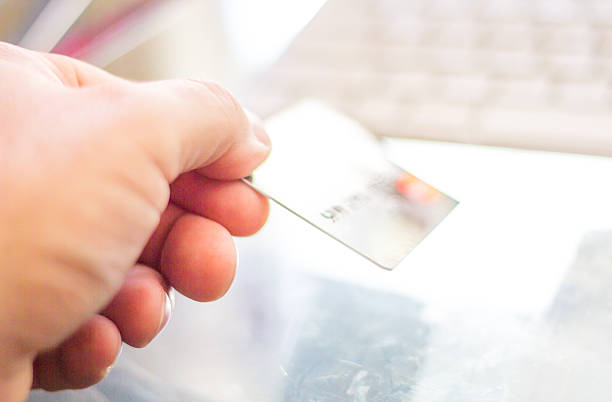 istock Paying With Credit Card - Stock Image 612615102