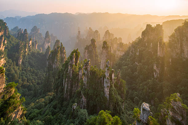 Zhangjiajie National Forest Park, Hunan, China Tian Zi Mountain of Zhangjiajie National Forest Park at sunset, Hunan, China zhangjiajie photos stock pictures, royalty-free photos & images