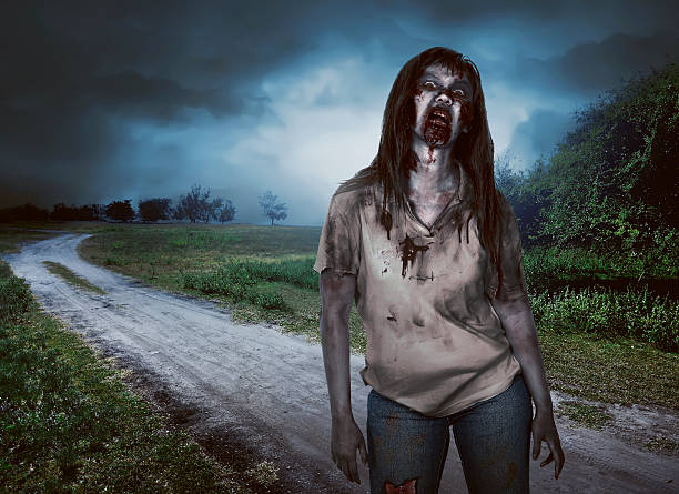 istock Scary zombie woman with wounds walking 612615882