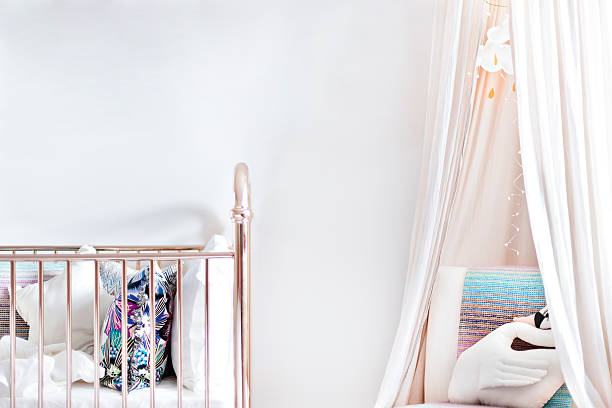 istock Modern bathroom with a shiny bed and mosquito net 612616774