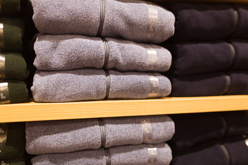 Fleece sweater stack in the shelf in the retail market