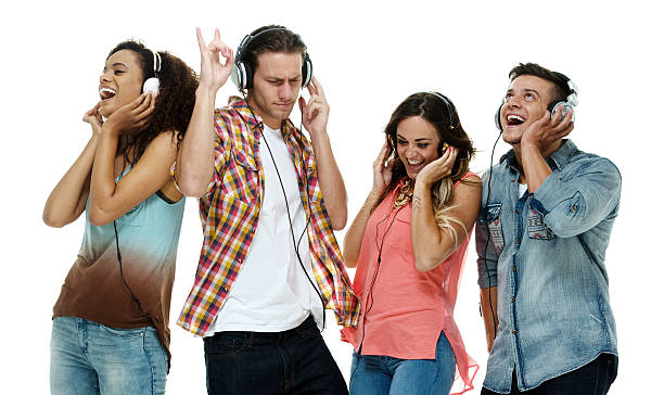 istock Four friends listening music 612617842