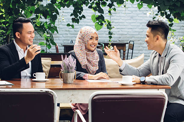 istock business people teamwork meeting at cafe 612618126
