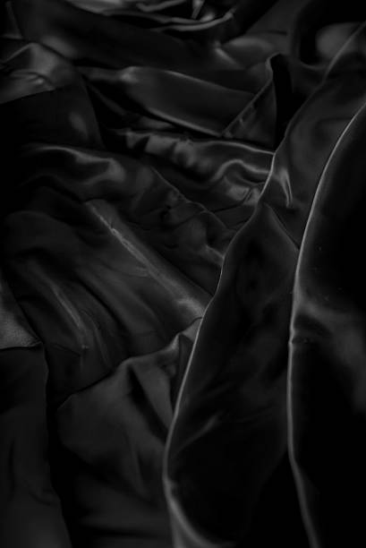 istock abstract background crumpled or wavy folds of fabric texture 612620184