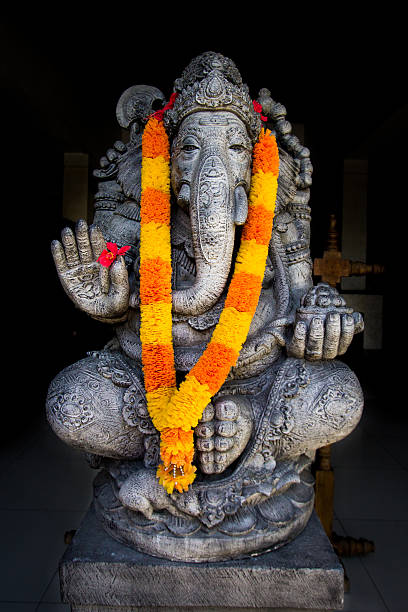 istock Ganesh Statue with flower garland 612620958