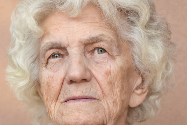 istock Beautiful Senior Woman Portrait Happy Expression 612623360