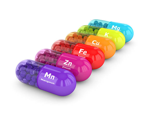 白の上に分離スプーンの栄養補助食品の3dレンダリング - zinc mineral nutritional supplement pill ストックフォトと画像