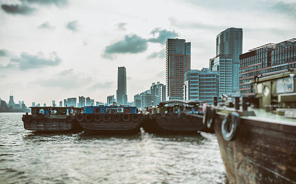 istock Ships in River With cityscape In Background 612623676