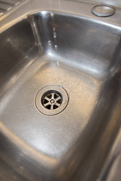 istock Mixer tap Faucet on the kitchen sink 612625072